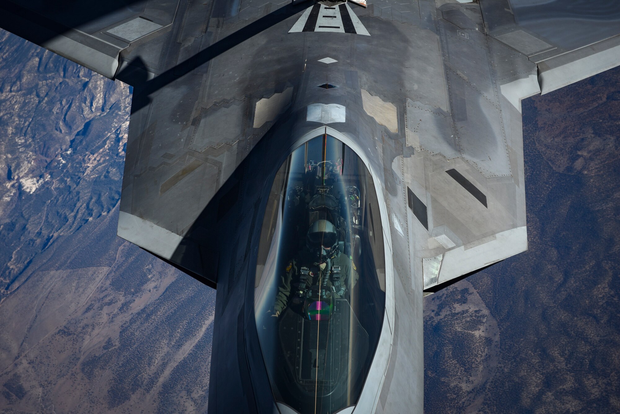 An F-22 Raptor assigned to the 27th Fighter Squadron at Joint Base Langley-Eustis, Va., receives fuel during Red Flag 18-1 over the Nevada Test and Training Range, Feb. 7, 2018. Red Flag helps pilots train for real-time war scenarios and tests their readiness for future conflicts. (U.S. Air Force photo by Airman 1st Class Andrew D. Sarver)