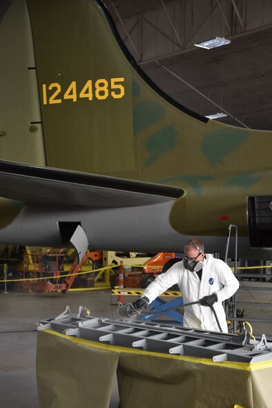 (02/13/2018) -- National Museum of the U.S. Air Force restoration specialist Brian Lindamood paints the bomb bay of the Boeing B-17F Memphis Belle. Plans call for the aircraft to be placed on permanent public display in the WWII Gallery here at the National Museum of the U.S. Air Force on May 17, 2018. (U.S. Air Force photo by Ken LaRock)