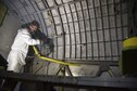 (02/13/2018) -- National Museum of the U.S. Air Force restoration specialist Brian Lindamood paints the bomb bay of the Boeing B-17F Memphis Belle. Plans call for the aircraft to be placed on permanent public display in the WWII Gallery here at the National Museum of the U.S. Air Force on May 17, 2018. (U.S. Air Force photo by Ken LaRock)