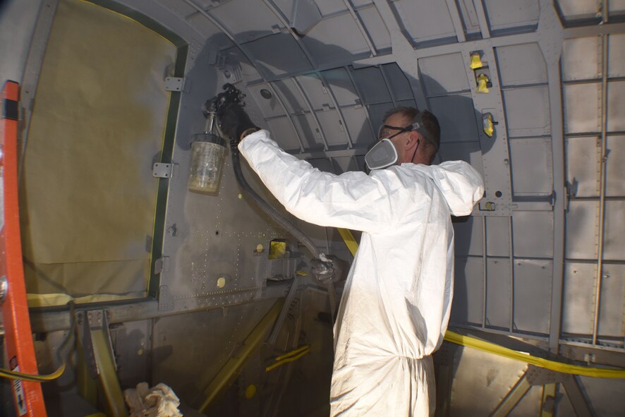 (02/13/2018) -- National Museum of the U.S. Air Force restoration specialist Brian Lindamood paints the bomb bay of the Boeing B-17F Memphis Belle. Plans call for the aircraft to be placed on permanent public display in the WWII Gallery here at the National Museum of the U.S. Air Force on May 17, 2018. (U.S. Air Force photo by Ken LaRock)