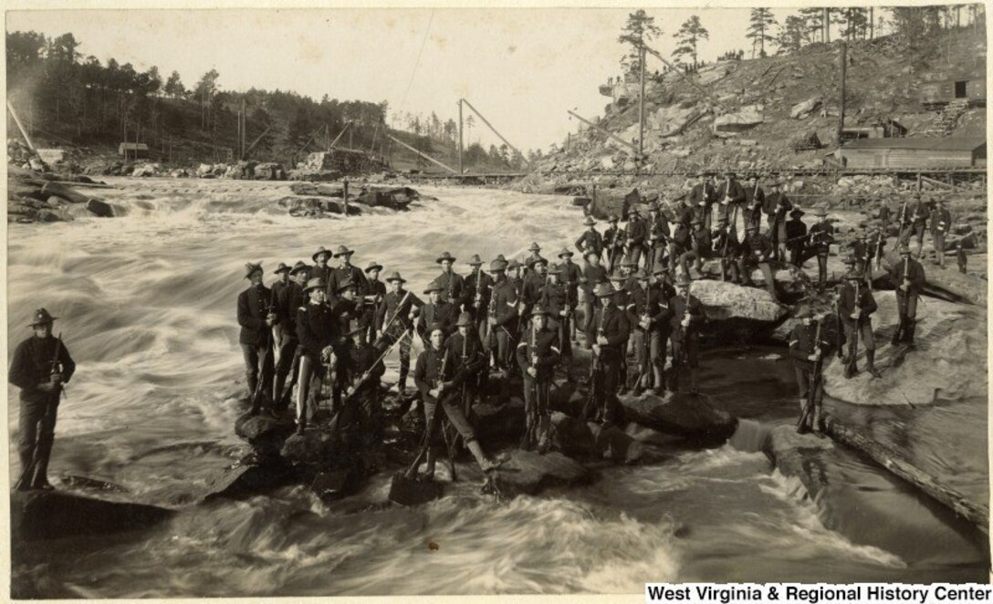 A photo of Company B, First West Virginia Infantry, commanded by Capt. John B. White, at the Chattahootchee River in Columbus, Ga., in 1898. The unit was training in Georgia during the Spanish-American War. Photo courtesy of West Virginia University’s West Virginia and Regional History Center