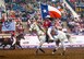 Members of the San Angelo Ambassadors ride through the arena with flags representing Texas and all of the military services during Military Appreciation Night at the San Angelo Stock Show and Rodeo at the Foster Communications Coliseum, Feb. 14, 2018, San Angelo, Texas. The Ambassador program is a rodeo drill team with 12 members who must be excellent riders and horse-women. (U.S. Air Force photo by Aryn Lockhart/Released)