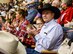 U.S. Air Force Col. Jeffrey Sorrell, 17th Training Wing vice commander, watches the rodeo events with his family during Military Appreciation Night at the San Angelo Stock Show and Rodeo held at the Foster Communications Coliseum, Feb. 14, 2018, San Angelo, Texas. Rodeo events included bronc riding, bull riding, calf roping, steer wrestling, team roping and mutton busting. (U.S. Air Force photo by Aryn Lockhart/Released)