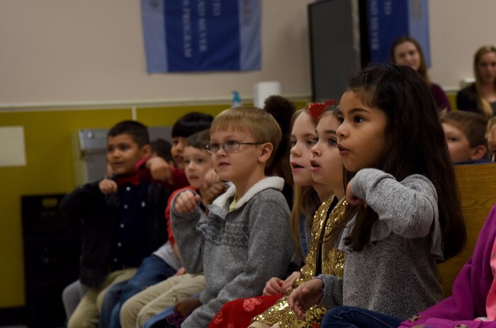Students interact with the 628th Medical Group Deily Dental Clinic staff workers during a school visit at Marrington Elementary School Feb. 14, 2018, in South Carolina.