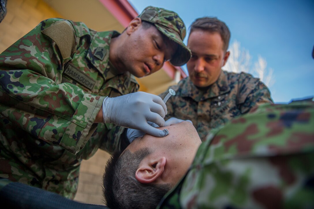 MARINE CORPS BASE CAMP PENDLETON, Calif. – A Japan Ground Self Defense Soldier practices how to use a nasopharyngeal airway while attending a Combat Life Savers Course during exercise Iron Fist 2018, Jan. 17. Exercise Iron Fist is an annual bilateral training exercise where U.S. and Japanese service members train together and share technique, tactics and procedures to improve their combined operational capabilities. (U.S. Marine Corps photo by Lance Cpl. Robert Alejandre)