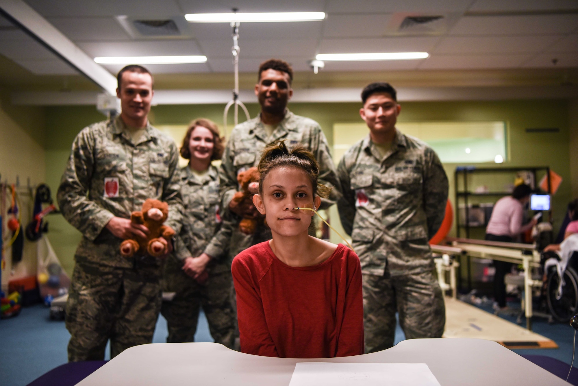 Some Airmen from F.E. Warren Air Force Base, Wyo., visited the rehabilitation facility at the Children’s Hospital Colorado, Aurora, Colorado, Feb. 14, 2018, to deliver teddy bears to the patients. Each wing has a dedicated rehab room for the children to regain any abilities lost or weakened due to their illness or injury. 100 bears were donated by the Warren Top 3, a private organization on base, to hand out to the children in the neurology and orthopedic wings. (U.S. Air Force photo by Airman 1st Class Abbigayle Wagner)