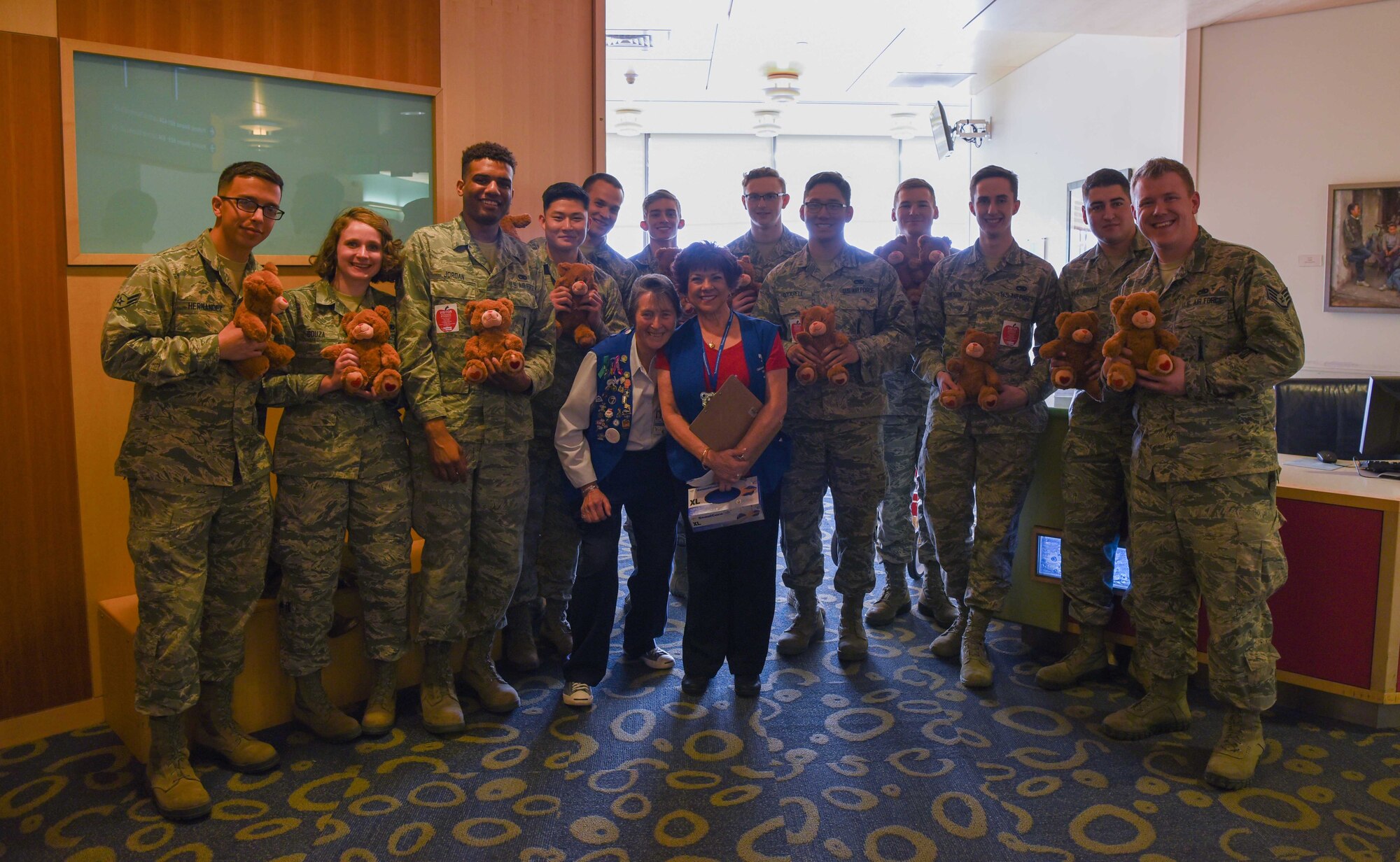 Thirteen Airmen from F.E. Warren Air Force Base, Wyo., spent the afternoon at the Children’s Hospital Colorado, Aurora, Colorado, Feb. 14, 2018, with two volunteer leads coordinating a teddy bear delivery. Senior Airman Sitry Jordan, 790th Missile Maintenance Squadron missile maintainer and teddy bear delivery organizer, enjoyed the experience of bringing Valentine’s Day to the children and hopes to make this an annual event for future Airmen. 100 bears were donated by the Warren Top 3, a private organization on base, to hand out to the children in the neurology and orthopedic wings. (U.S. Air Force photo by Airman 1st Class Abbigayle Wagner)