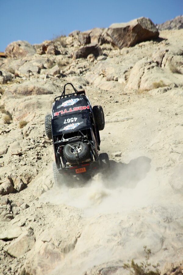Jeremy Palmer of Beaumont, Calif., goes up on two wheels as he races up Front Door outside Hammertown in Johnson Valley, Calif., Feb. 5, 2018. King of the Hammers is the largest off-road racing and rock-crawling event in North America. (Marine Corps photo by Kelly O’Sullivan)