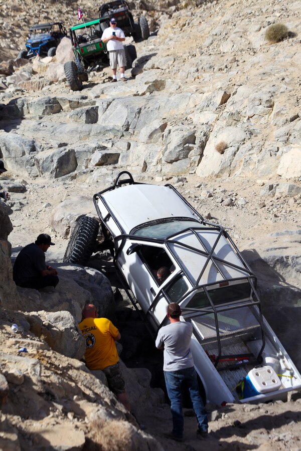 A rock-crawler tries to make his way up Back Door in Johnson Valley, Calif., Feb. 5, 2018. The challenging climb filled with rocks and deep craters is one of many that King of the Hammers attendees take on during KOH, the largest racing and rock-crawling event in North America. (Marine Corps photo by Kelly O’Sullivan)