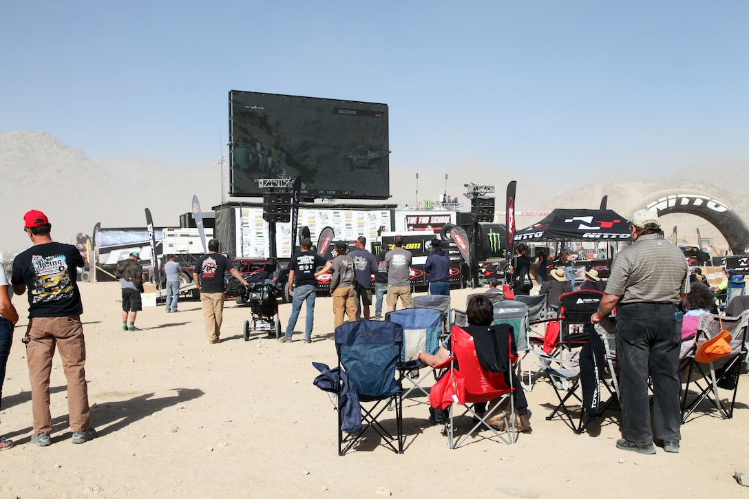 King of the Hammers attendees watch live-streamed action on the Jumbotron in Hammertown, Feb. 7, 2018. King of the Hammers, held every February in Johnson Valley, is the largest off-road racing and rock-crawling event in North America. (Marine Corps photo by Kelly O'Sullivan)