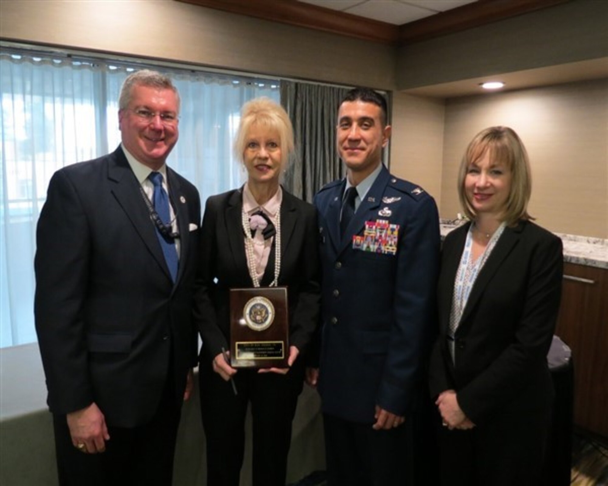 Accepting the Air Force Community Partnership Program Leadership Excellence award on behalf of the City of San Angelo and Goodfellow Air Force Base are the Director of the Texas Military Preparedness Commission, Mr. Keith Graf, The City of San Angelo Mayor, Ms. Brenda Gunter, U.S. Air Force Col. Ricky Mills, 17th Training Wing commander, and the 17th Mission Support Group Deputy Director, Ms. Toni Hansen, Feb. 12, 2018, at the Association of Defense Communities Installation Innovation Forum in San Diego, Calif.