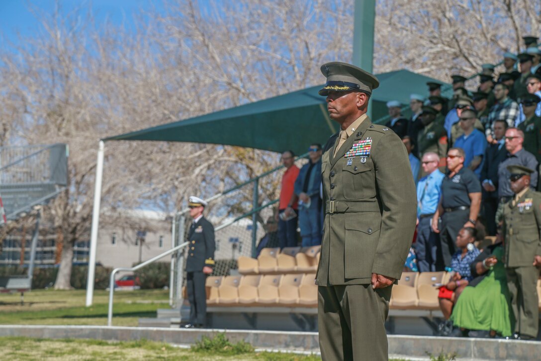 Lt. Col. Rafael Candelario II, commanding officer, 3rd Light Armored Reconnaissance Battalion, observes his battalion's pass in review during the deactivation ceremony of D Company "Dragoons" aboard the Marine Corps Air Ground Combat Center, Twentynine Palms, Calif., Feb. 09, 2018. D Company was deactivated by order of the Commandant of the Marine Corps after 32 years of service. (U.S. Marine Corps photo by Lance Cpl. Preston L. Morris)