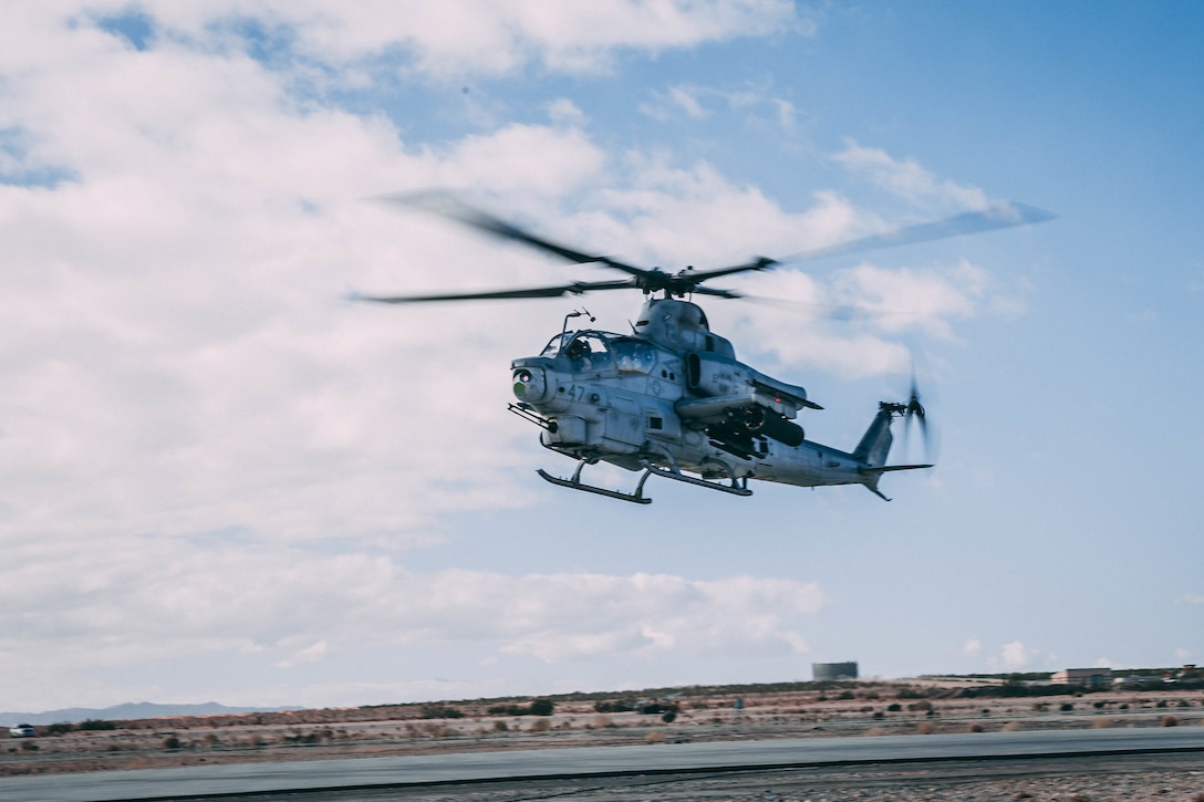 A Bell AH-1Z Viper takes off at the Air Combat Element landing strip at Marine Corps Air Ground Combat Center, Twentynine Palms, Calif., Feb. 13, 2018, as a part of Integrated Training Exercise 2-18. The purpose of ITX is to create a challenging, realistic training environment that produces combat-ready forces capable of operating as an integrated MAGTF. (U.S. Marine Corps Photo by Pfc. William Chockey)