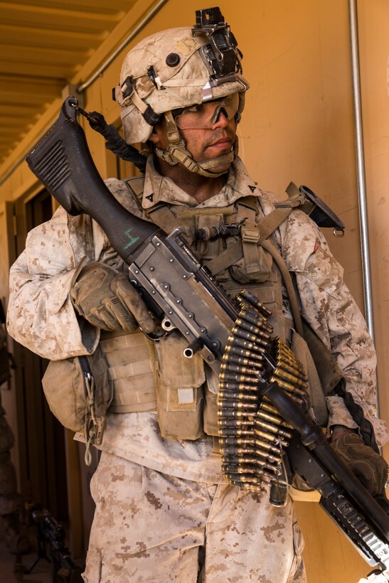 Lance Cpl. Alexander Barron, machine gunner, 3rd Battalion, 7th Marine Regiment, prepares to receive orders at Range 220 aboard the Marine Corps Air Ground Combat Center, Twentynine Palms, Calif.,  Feb. 9, 2018 as part of Integrated Training Exercise 2-18. The purpose of ITX is to create a challenging, realistic training environment that produces combat-ready forces capable of operating as an integrated MAGTF. (U.S. Marine Corps photo by Lance Cpl. Margaret Gale)