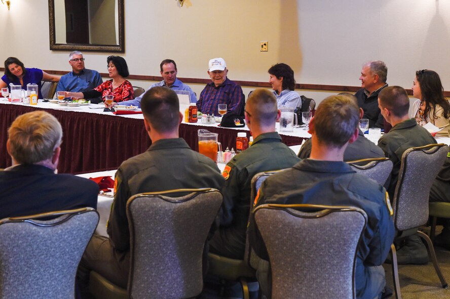 Retired Brig. Gen. Chuck Yeager spends time with team Luke Thunderbolts during a luncheon at Luke Air Force Base, Ariz., Feb. 13, 2018. As part of Yeager’s 95th birthday celebration, he participated in telling stories about his Air Force career and time spent at Luke earning his pilot wings in the 1940s. (U.S. Air Force photo by Staff Sgt. Jensen Stidham)