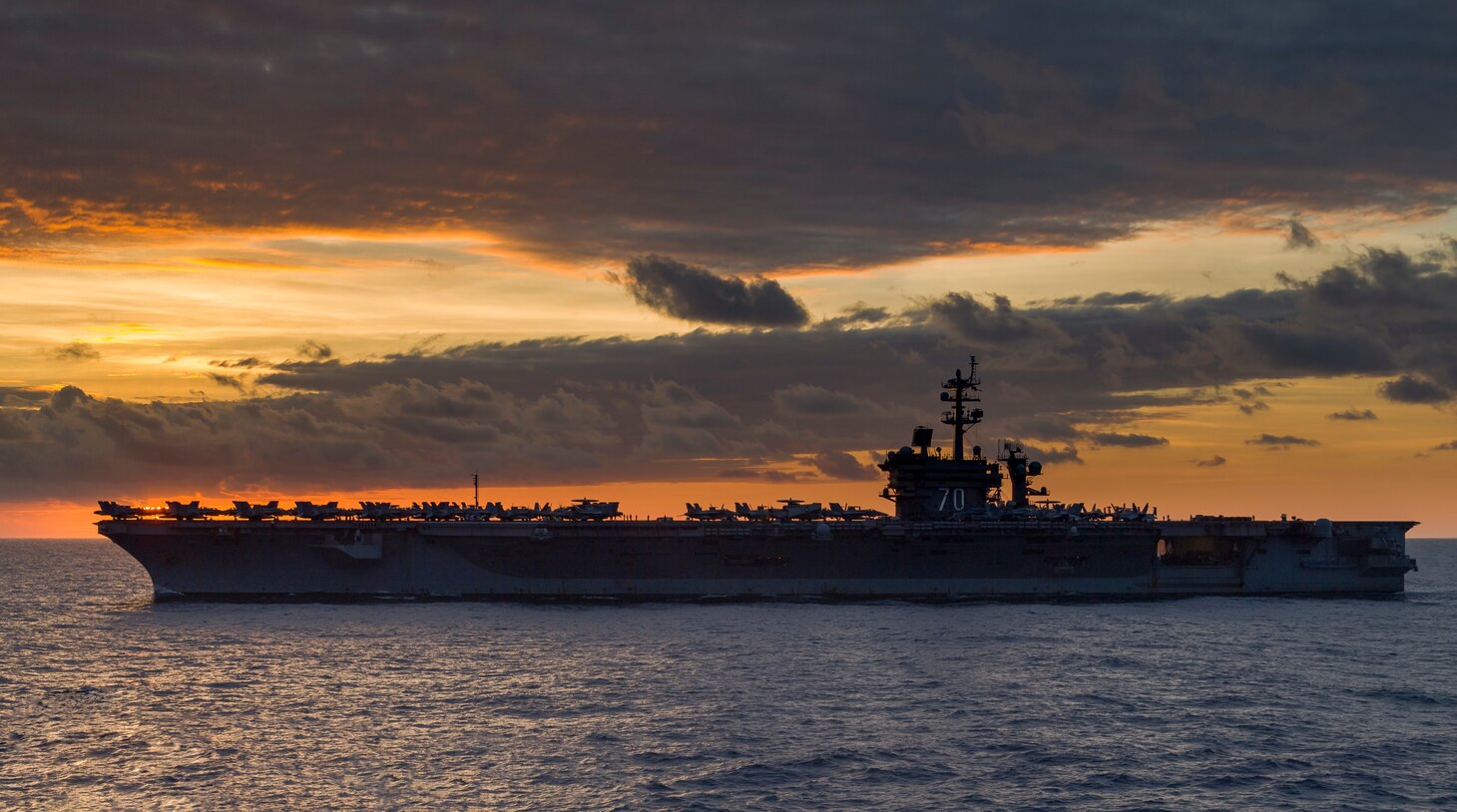 The Nimitz-class aircraft carrier USS Carl Vinson (CVN 70) transits the South Chna Sea. The Carl Vinson Strike Group is currently operating in the Western Pacific as part of a regularly schedule deployment.