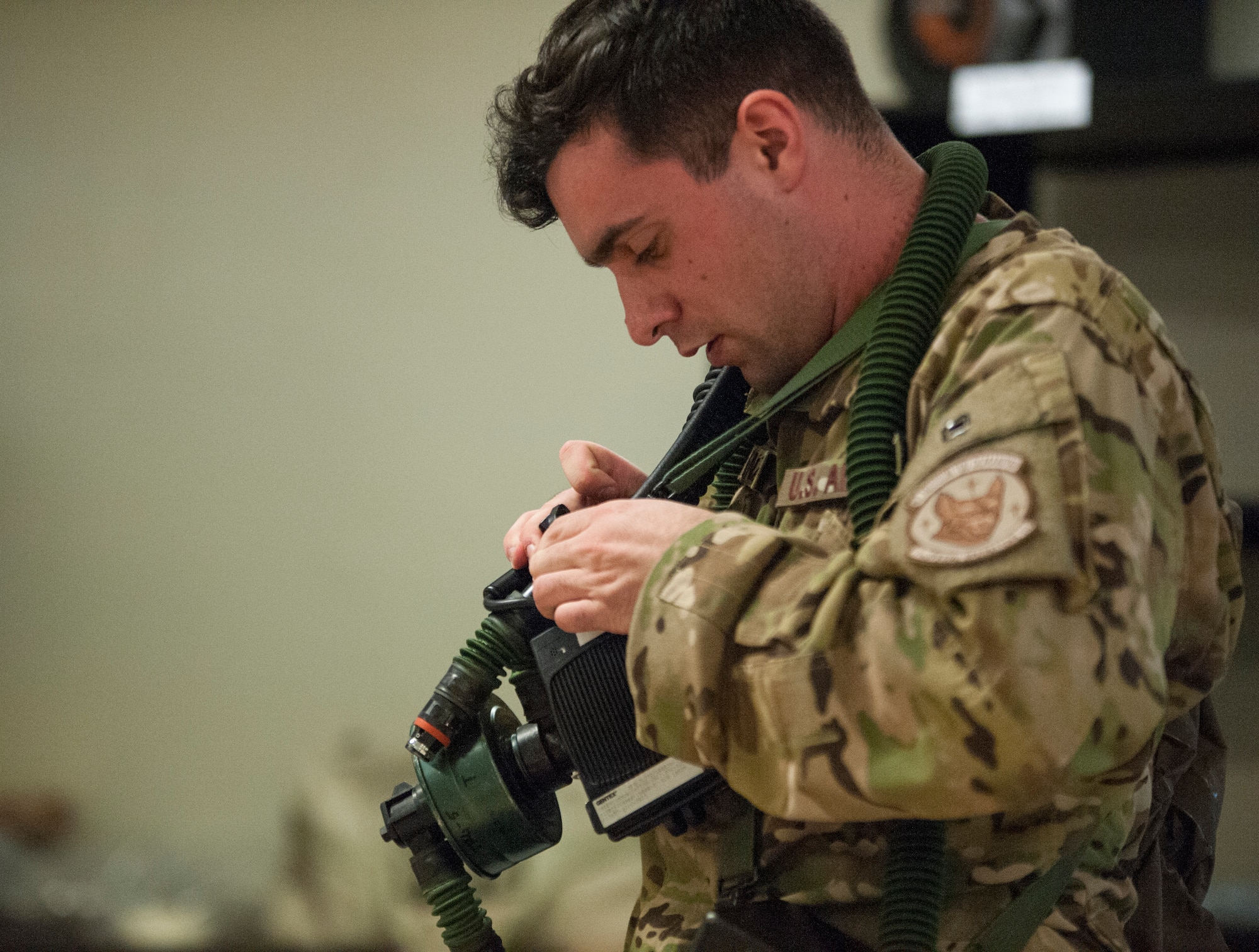 Aircrew conduct in-flight training with protective gear