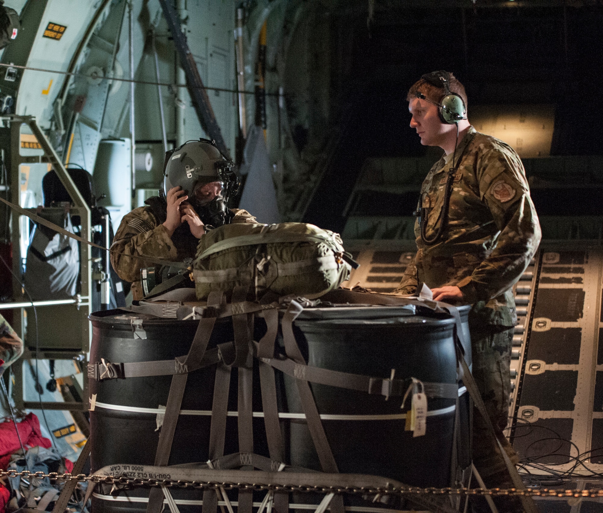 Aircrew conduct in-flight training with protective gear