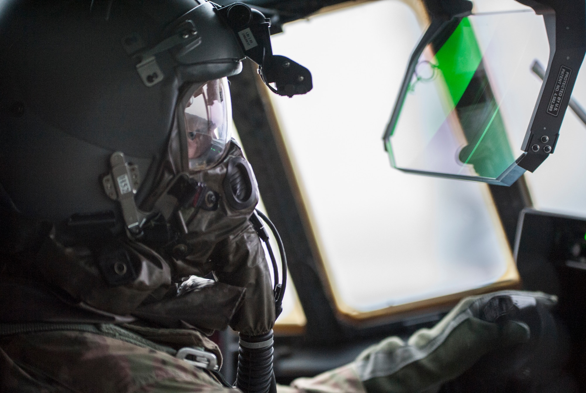 Aircrew conduct in-flight training with protective gear