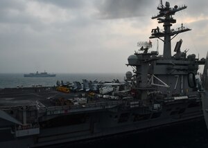 The aircraft carrier USS Theodore Roosevelt (CVN 71) and United Kingdom’s Royal Fleet Auxiliary (RFA) Fort Rosalie (A385)