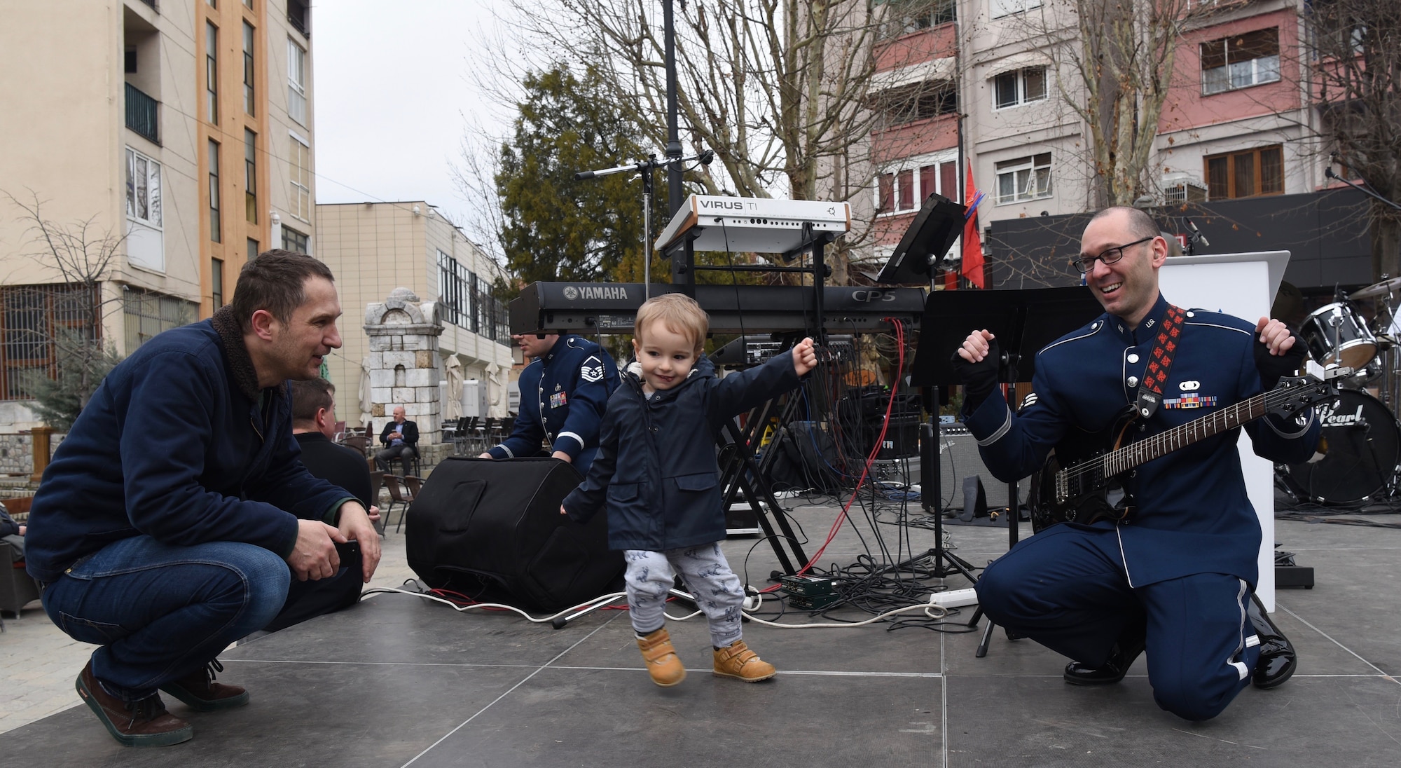 The U.S. Air Forces in Europe Band interacts with community members before a performance in Prizren, Kosovo, Feb. 18, 2018. The band was in Kosovo to celebrate the 10th anniversary of Kosovo independence. (U.S. Air Force photo by Maj. Tristan Hinderliter)