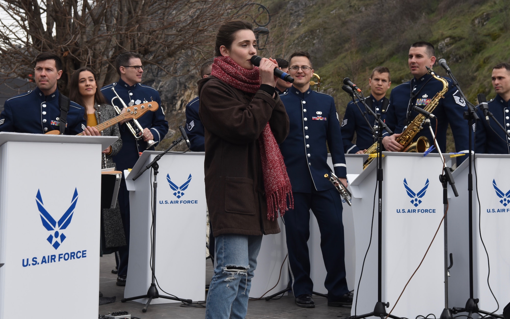 The U.S. Air Forces in Europe Band performs in Prizren, Kosovo, in celebration of the country’s 10th anniversary of independence, Feb. 18, 2018. During the performance, the band brought onstage Kosovar musician Denisa Sadiku, a vocalist who excelled on the show “The Voice Albania,” and Anda Gjini, a flute player in her final semester studying music at the University of Pristina. (U.S. Air Force photo by Maj. Tristan Hinderliter)