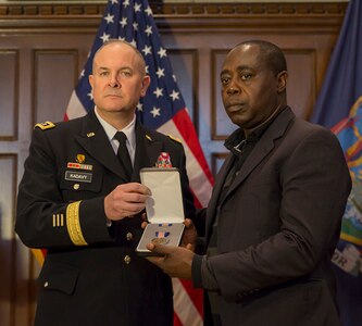 Soldier honored for fire rescues