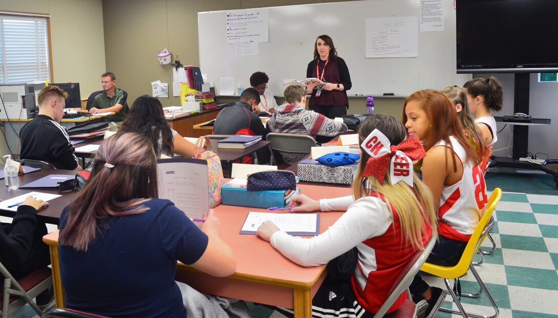 Marine Corps Community Services Family Advocate Kristiana Poole speaks with Marine Corps Base Quantico eighth graders about safe dating.