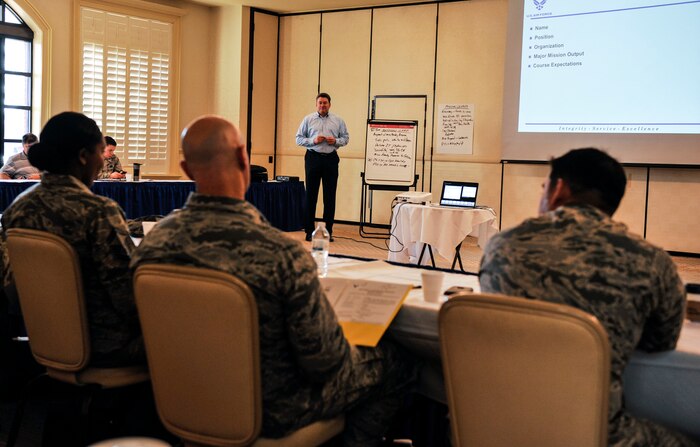 Phil Chansler, assistant professor of operations management with Air Education and Training Command, Maxwell Air Force Base, Ala., conducts a continuous process improvement course Feb. 15, 2018, at Joint Base Charleston, S.C.