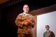 Chief Master Sgt. Matthew Caruso, command senior enlisted leader of U.S. Transportation Command, speaks to senior NCOs Feb. 15, 2018, during an all call at the theater on Seymour Johnson Air Force Base, North Carolina.