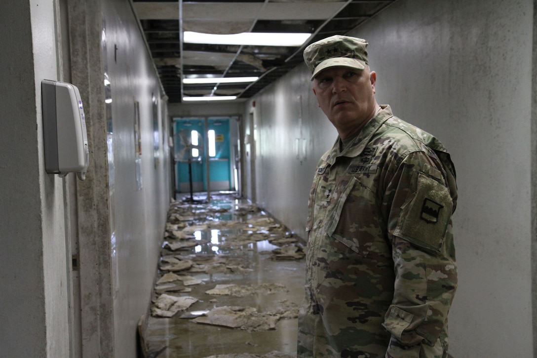 Maj. Gen. Bruce Hackett, commanding General of the 80th Training Command witnesses some of the devastation of Hurricane Maria at a severely damaged training facility on 14 February 2018. Maj. Gen. Hackett and Brig. Gen. Hector Lopez were on the island to celebrate the reopening and relocation of a new schoolhouse for the 94th Training Division's 5th Battalion, as well as to assist with the planned tranistion and approved reassignment of all units stationed in Puerto Rico to the operational control of the 1st Mission Support Command.

Photo by Army Master Sgt. Benari Poulten, 80th Training Command Public Affairs.