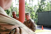 Maj. Gen. Bruce Hackett, commanding general of the 80th Training Command, talks with students of the mortuary affairs specialist course at Fort Buchanan, 14 February 2018. Maj. Gen. Hackett and Brig. Gen. Lopez were at Fort Buchanan to celebrate the reopening and relocation of a schoolhouse for the 94th Training Division's 5th Battalion. They were also on the island to assist with the planned tranistion and approved reassignment of all units stationed in Puerto Rico to the operational control of the 1st Mission Support Command.

Photo by Army Master Sgt. Benari Poulten, 80th Training Command (TASS) Public Affairs
