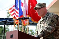 Maj. Gen. Bruce Hackett, commanding General of the 80th Training Command speaks at the ribbon-cutting ceremony at Fort Buchanan, Puerto Rico to celebrate the reopening and relocation of a schoolhouse for the 94th Training Division's 5th Battalion on 13 February 2018. The 5th BN's previous schoolhouse was severely damaged by the devastation of Hurricane Maria. Maj. Gen. Hackett and Brig. Gen. Hector Lopez, commanding general of the 94th Training Division, were also on the island to assist with the planned tranistion and approved reassignment of all units stationed in Puerto Rico to the operational control of the 1st Mission Support Command.

Photo by Army Master Sgt. Benari Poulten, 80th Training Command (TASS) Public Affairs