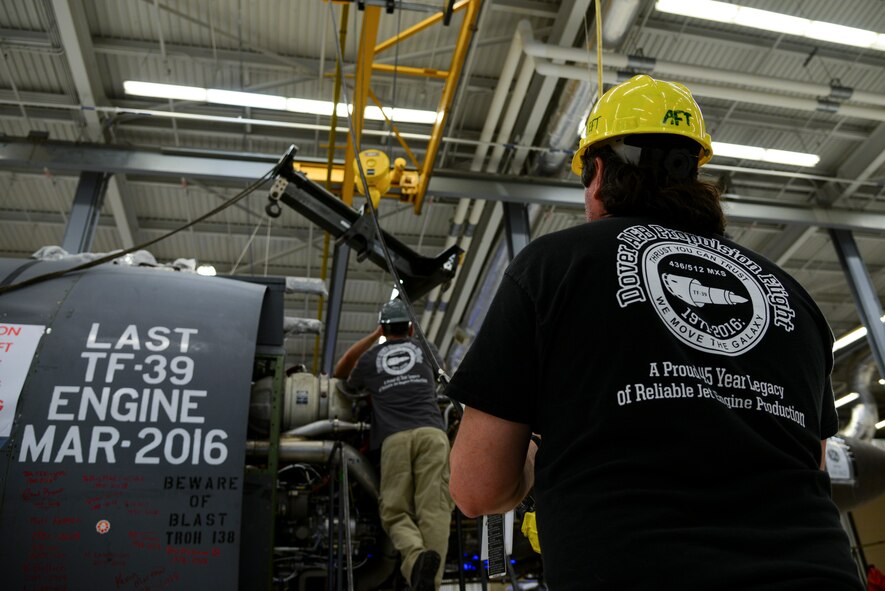 Travis Olsen (front) and Jeffrey Martindale, 436th Maintenance Squadron aerospace propulsion engine mechanics, position a lift on a General Electric TF-39 turbofan engine Feb. 16, 2018, at the Jet Engine Intermediate Level Maintenance Shop on Dover Air Force Base, Del. The engine pictured was the last TF-39 engine built and operated on a C-5 Galaxy, and the very last one owned by the Air Force. (U.S. Air Force photo by Staff Sgt. Aaron J. Jenne)