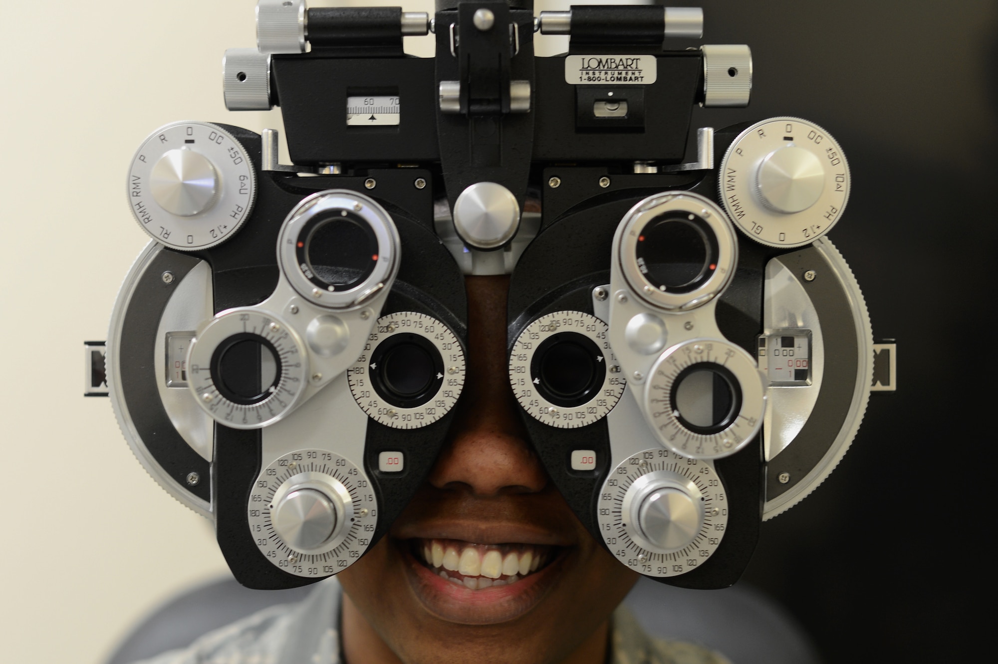 A patient looks through a diopter instrument at the 48th Medical Group optometry clinic, Jan. 17, 2018. The optometry clinic’s goal is to provide the best care they can to active duty members and their dependents. (U.S. Air Force photo/Senior Airman Elizabeth Taranto)