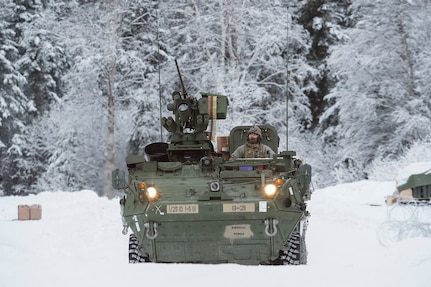 Soldiers assigned to Bayonet Company, 1st Battalion, 5th Infantry Regiment, 1st Stryker Brigade Combat Team, 25th Infantry Division, U.S. Army Alaska, prepare for live-fire gunnery training during Operation Punchbowl at Joint Base Elmendorf-Richardson, Alaska, Feb. 16, 2018. Operation Punchbowl was a battalion-level, combined arms, live-fire exercise that focused on arctic lethality.