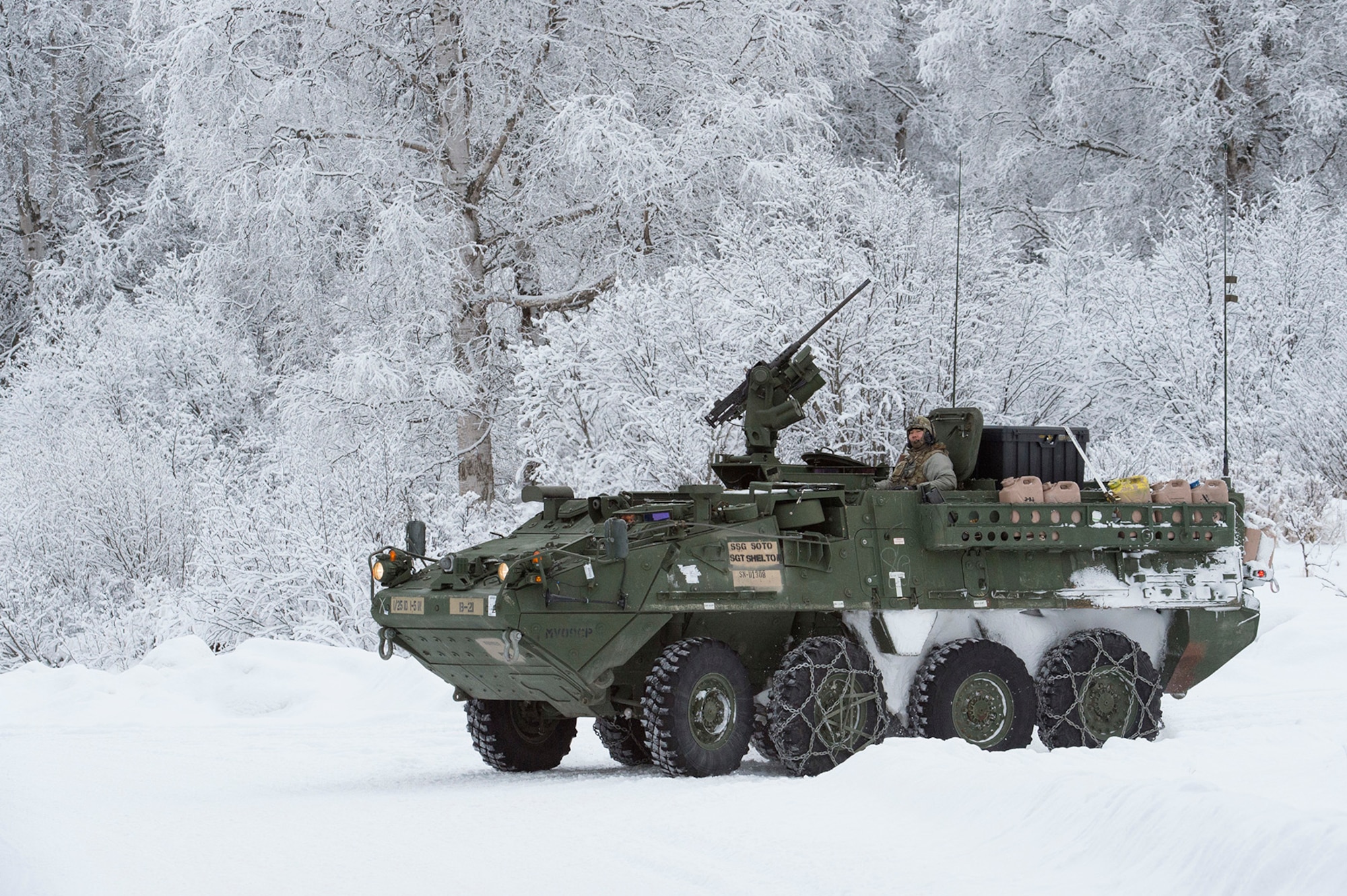 Soldiers assigned to Bayonet Company, 1st Battalion, 5th Infantry Regiment, 1st Stryker Brigade Combat Team, 25th Infantry Division, U.S. Army Alaska, prepare for live-fire gunnery training during Operation Punchbowl at Joint Base Elmendorf-Richardson, Alaska, Feb. 16, 2018. Operation Punchbowl was a battalion-level, combined arms, live-fire exercise that focused on arctic lethality.