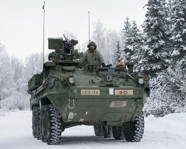 Soldiers assigned to Bayonet Company, 1st Battalion, 5th Infantry Regiment, 1st Stryker Brigade Combat Team, 25th Infantry Division, U.S. Army Alaska, prepare for live-fire gunnery training during Operation Punchbowl at Joint Base Elmendorf-Richardson, Alaska, Feb. 16, 2018. Operation Punchbowl was a battalion-level, combined arms, live-fire exercise that focused on arctic lethality.