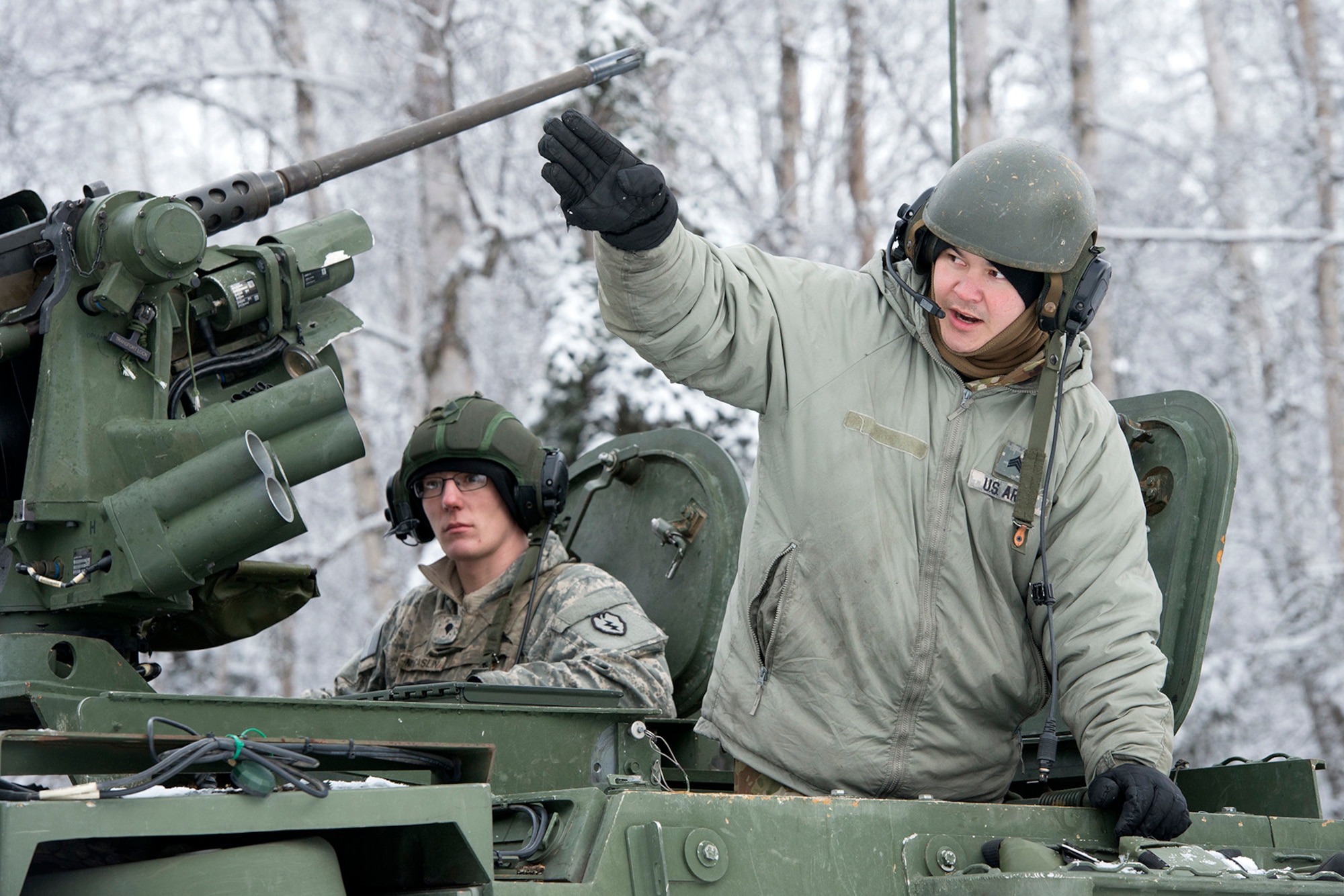 Soldiers assigned to Bayonet Company, 1st Battalion, 5th Infantry Regiment, 1st Stryker Brigade Combat Team, 25th Infantry Division, U.S. Army Alaska, prepare for live-fire gunnery training during Operation Punchbowl at Joint Base Elmendorf-Richardson, Alaska, Feb. 16, 2018. Operation Punchbowl was a battalion-level, combined arms, live-fire exercise that focused on arctic lethality.