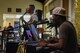 U.S. Air Force Airman Deon Stevenson, 312th Training Squadron trainee, plays guitar while Airman Lanas Jess II, 315th Training Squadron trainee, plays the piano during the 11th Annual Talent Show at the Crossroads on Goodfellow Air Force Base, Texas, Feb. 16, 2018.  Stevenson and Jess joined together to compete against 10 other acts during the talent show. (U.S. Air Force Photo by Airman 1st Class Zachary Chapman/Released)