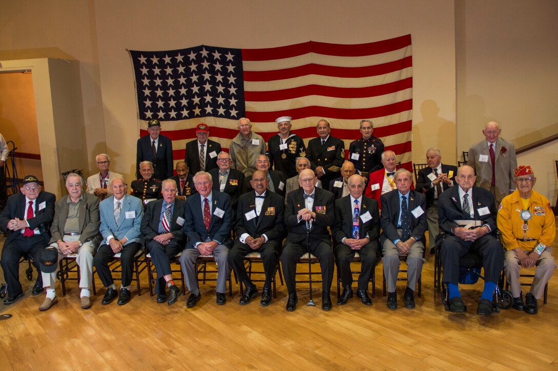U.S. Marines, veterans and family gathered for the Iwo Jima Commemorative Banquet to celebrate the 73rd anniversary of the Battle of Iwo Jima at Marine Corps Base Camp Pendleton, Calif., February 17, 2018. The evening included a sunset memorial, 21-gun salute and banquet. (U.S. Marine Corps photo by Lance Cpl. Noah Rudash)