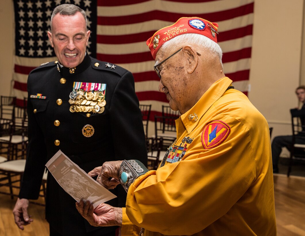 Thomas H Begay, Navajo Code Talker and survivor of the Battle of Iwo Jima, speaks with Maj. Gen. Vincent Coglianese at the 73rd Anniversary of the Battle of Iwo Jima celebration on Marine Corps Base Camp Pendleton, Calif., February 17, 2018. The evening included a sunset memorial, 21-gun salute and banquet. (U.S. Marine Corps photo by Pfc. Drake Nickels)