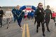 Runners leave the starting line at the St. Valentine’s Day 5k/10k Feb. 14, 2018, at Dover Air Force Base, Del. The run was open to all Team Dover personnel and their families. (U.S. Air Force photo by Mauricio Campino)