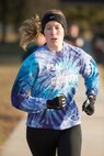 A runner approaches the home stretch of the St. Valentine’s Day 5k/10k Feb. 14, 2018, at Dover Air Force Base, Del. Over 185 Airmen, family members and civilian employees participated in the run. (U.S. Air Force photo by Mauricio Campino)