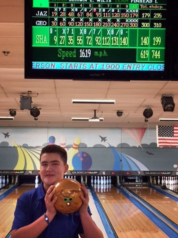 Father, son bowl perfect games