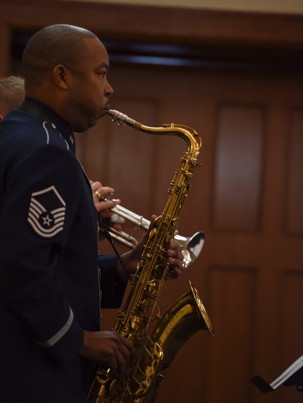 Saxophonist plays at Black History Month luncheon