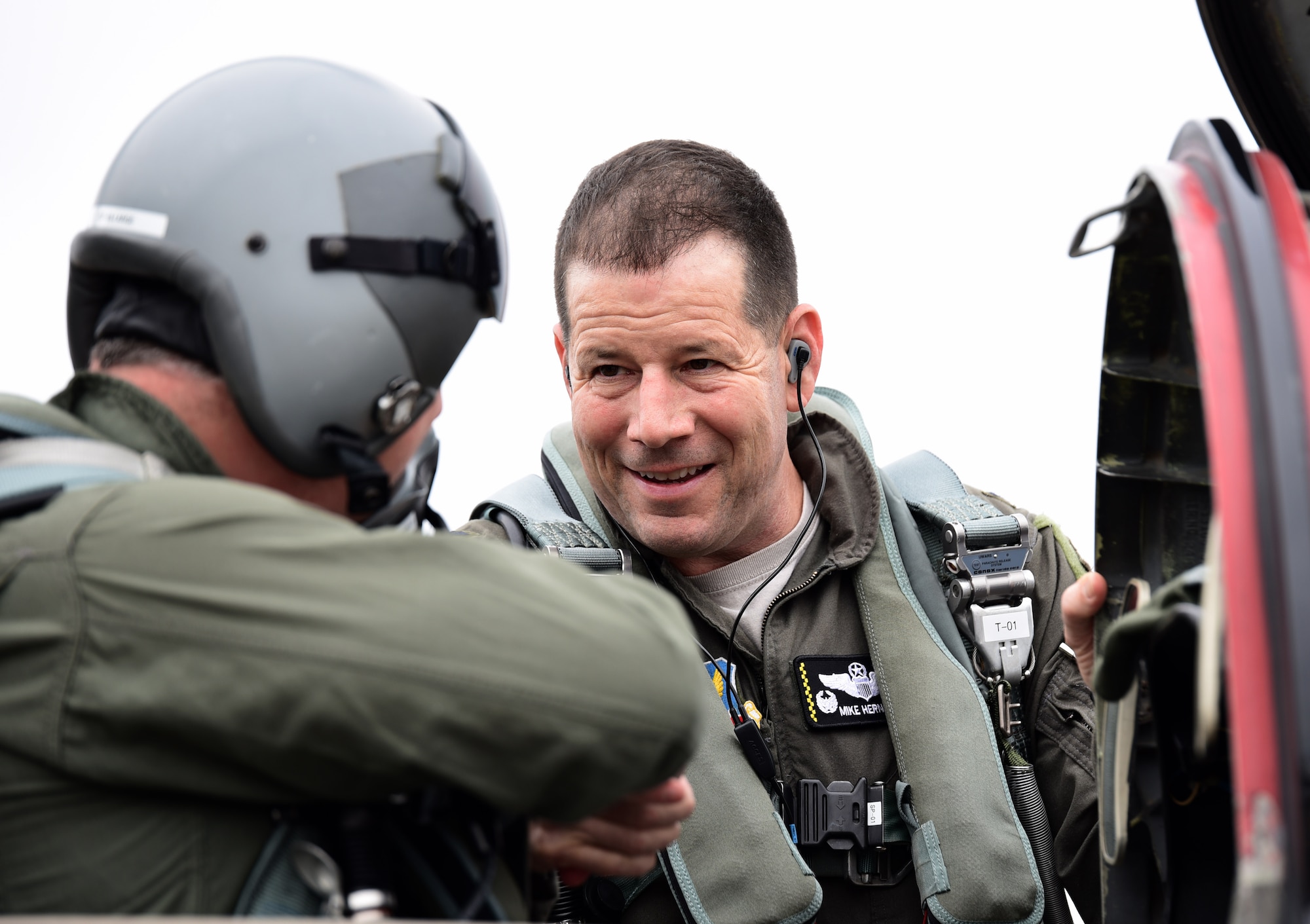 District 2 Bay County Commissioner Robert Carroll (left) shakes hands with U.S. Air Force Col. Michael Hernandez, 325th Fighter Wing commander (right), during a preflight inspection as they prepare to fly in a T-38 Talon familiarization flight at Tyndall Air Force Base, Fla., Feb. 14, 2018. Carroll is part of a five-member governing board elected at-large to represent the citizens of Bay County. (U.S. Air Force photo by Airman 1st Class Isaiah J. Soliz/Released)