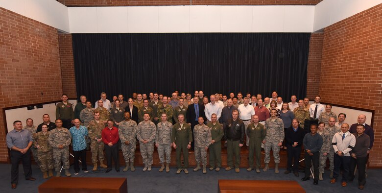 Over 80 participants in Global Mobility/Agile Combat Support (GLOMO/ACS18) pose for a photo during the exercise hosted by the U.S. Air Force Expeditionary Operations School on Joint Base McGuire-Dix-Lakehurst, February 12 through the16, 2018. (U.S. Air Force photo by Tech. Sgt. Jamie Powell)