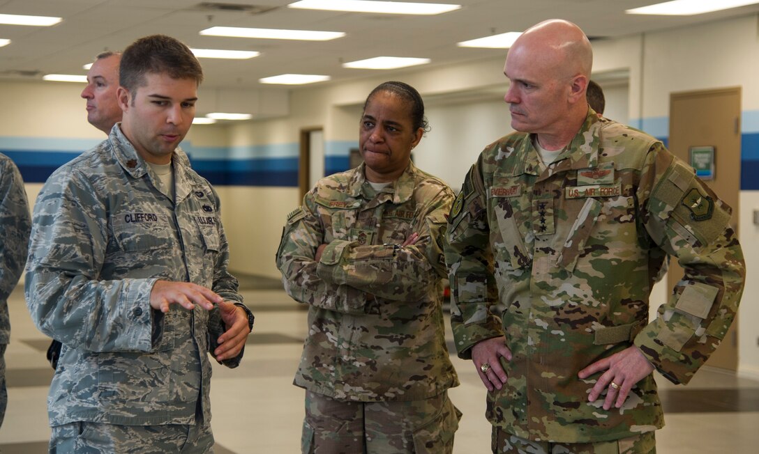 Maj. Joshua Clifford, 735th Air Mobility Squadron director of operations, briefs Gen. Carlton D. Everhart, Air Mobility Command commander, and Chief Master Sgt. Shelina Frey, Air Mobility Command command chief, on the recent renovations to the Passenger Terminal at Joint Base Pearl Harbor-Hickam, Feb. 11, 2018. Everhart visited the Airmen of the 515th Air Mobility Operations Wing Feb. 6-12 to better understand how the command can enhance enroute mobility operations support and enable global reach for the joint warfighter. The 515th AMOW, located at Joint Base Pearl Harbor-Hickam, Hawaii, oversees Air Mobility Commands enroute maintenance, command and control and aerial port support operations at 26 locations across 100 million square miles in the Pacific. (U.S. Air Force photo by Tech. Sgt. Heather Redman)