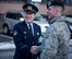 Nobuhiro Izumida, the Misawa City Police Station Chief shake hands with U.S. Air Force Maj. Patrick C. Gordon, the 35th Security Forces Squadron commander, after installing the first bi-lingual stop sign at an intersection in Misawa City, Japan, Feb. 15, 2018. While practically was the main objective in installing a bi-lingual stop sign, it can also be described as a great gesture of acceptance by the local community. (U.S. Air Force photo by Airman 1st Class Collette Brooks)